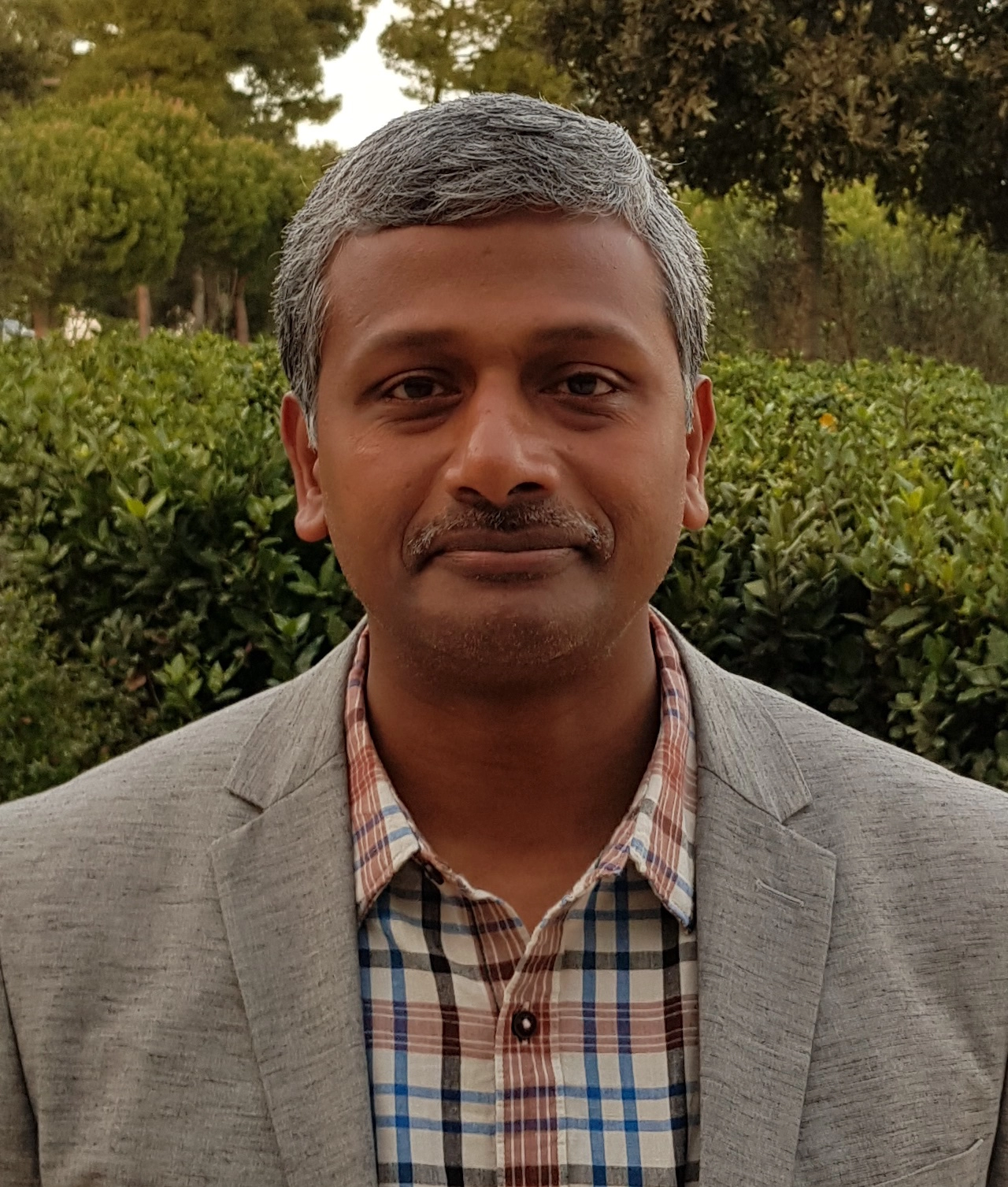 Dr. Manu Santhanam